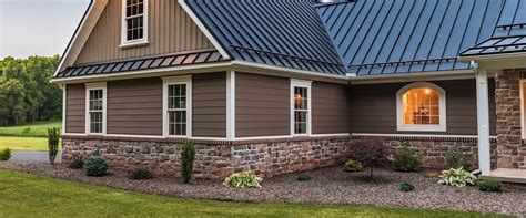 will a burgundy metal roof make your house hotter|are metal roofs noisy.